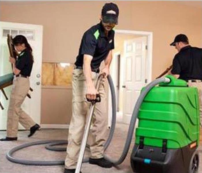 Servpro staff cleaning the office