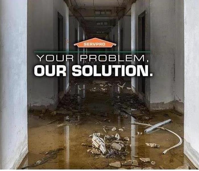 Flooded Hallway with caption "Your Problem. Our Solution."
